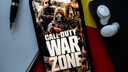 Logo for "Call of Duty: Warzone" on a smartphone