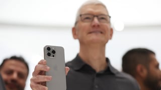 Apple CEO Tim Cook with iPhone 15 Pro