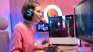 Woman Streams Live in Front of Computer
