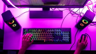 A gaming desk with equipment