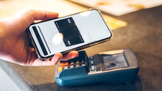 Person Pays via NFC with Smartphone