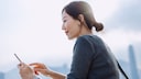 Woman Uses Smartphone