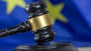 Gavel in front of a European Union flag