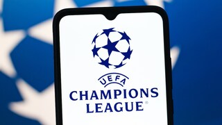 UEFA Champions League logo on a smartphone