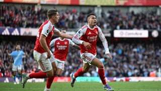 two Arsenal players on the field