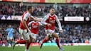 two Arsenal players on the field