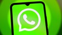 WhatsApp logo on a smartphone
