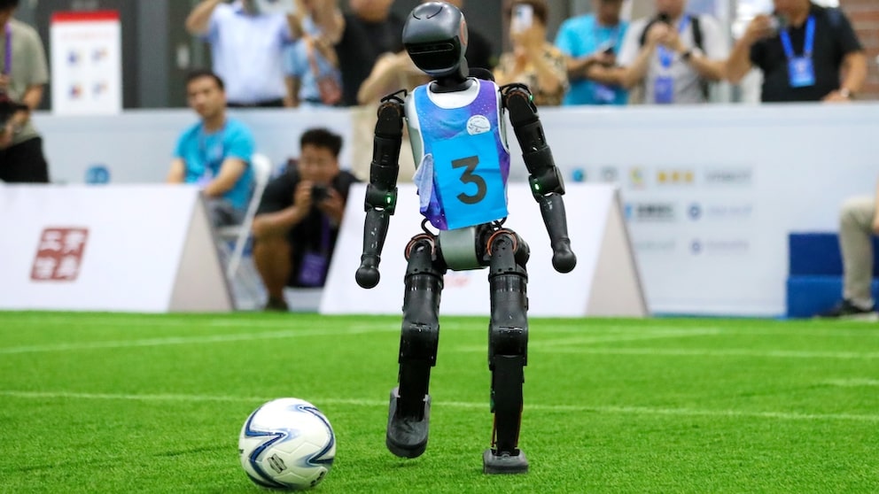 Robot Plays Soccer at RoboCup Asia-Pacific Qingdao Invitational Tournament in China
