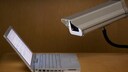 Surveillance camera is aimed at an open laptop