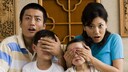 Parents Cover Children's Eyes While Watching TV
