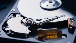 Why does the hard drive on a Windows system use the drive letter C instead of A or 1?
