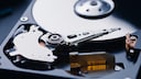 Why does the hard drive on a Windows system use the drive letter C instead of A or 1?