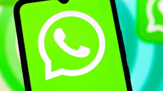 WhatsApp logo on a smartphone