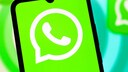 WhatsApp logo on a smartphone