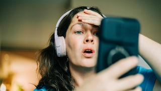 Shocked Woman on Smartphone