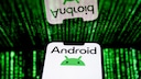 Smartphone with Android logo and green symbols in the background