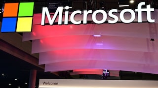Microsoft Logo and Lettering with Colorful Lights in the Background