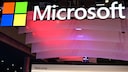 Microsoft Logo and Lettering with Colorful Lights in the Background