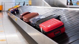 Luggage rack with suitcases