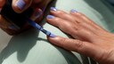Person paints their nails