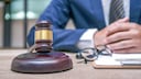 A judge discovered technical assistance being used by witnesses in court.
