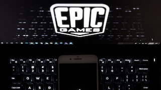 Laptop with Epic Logo and Apple Smartphone