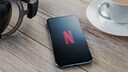 Netflix logo on a smartphone lying on a table