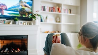Woman Looks at the TV