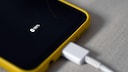 Smartphone with connected charging cable