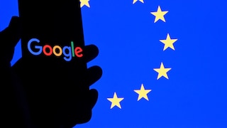 Smartphone with Google Logo and EU Flag in the Background