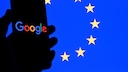 Smartphone with Google Logo and EU Flag in the Background