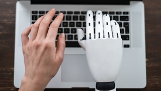 Robot Hand and Human Hand Typing on Computer