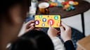 Child and Parent Playing on the Smartphone
