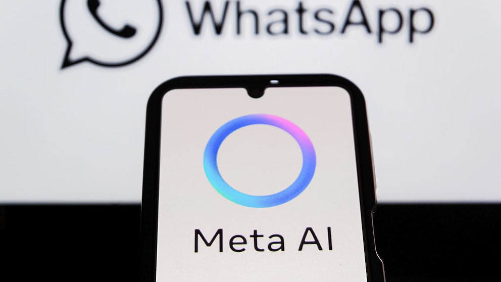 Smartphone with Meta AI logo and WhatsApp logo in the background