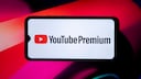 Smartphone with YouTube Premium Logo and Text