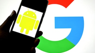 Smartphone with Android logo and Google logo in the background