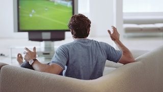 Man in Front of TV