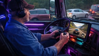 Truckers in the Cab Playing Video Games