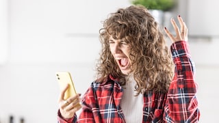 Woman Yells at Phone