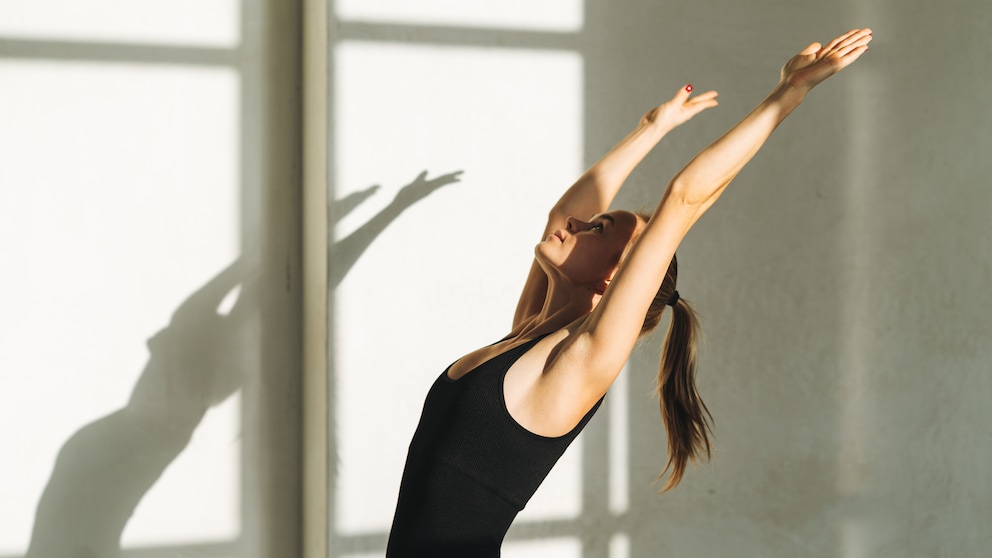 Woman Does Yoga