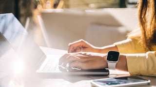 Woman Sitting in Front of Laptop