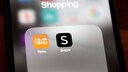 Smartphone with Temu and Shein Logo