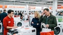 Couple Buys Washing Machine at Electronics Store