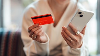 Woman Holding Smartphone and Credit Card