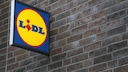 Lidl sign on a brick building wall