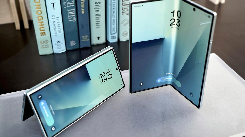 The Galaxy Z Fold 7 in front of a stack of books