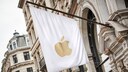 Flag with Apple logo on a house wall.