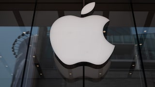 Apple logo on a window front.