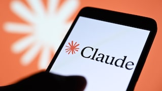 Smartphone with Claude branding, with the Claude logo in the background.