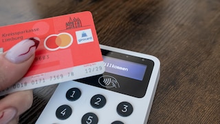 Girocard is held over a card reader